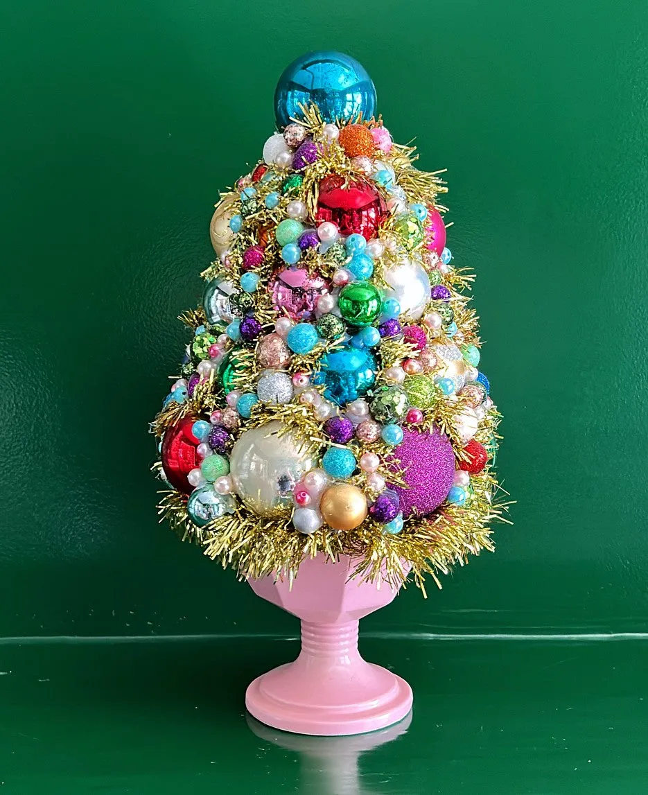 Handmade Christmas tree topiary in a vintage pink McCoy style urn.